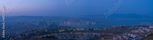 Panoramic view of the city of Izmir from the hill at dusk. Turkey 