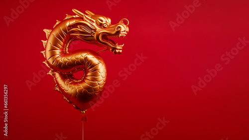 Chinese new year party: Gold Chinese zodiac dragon shape foil balloon on a red background for year 2024