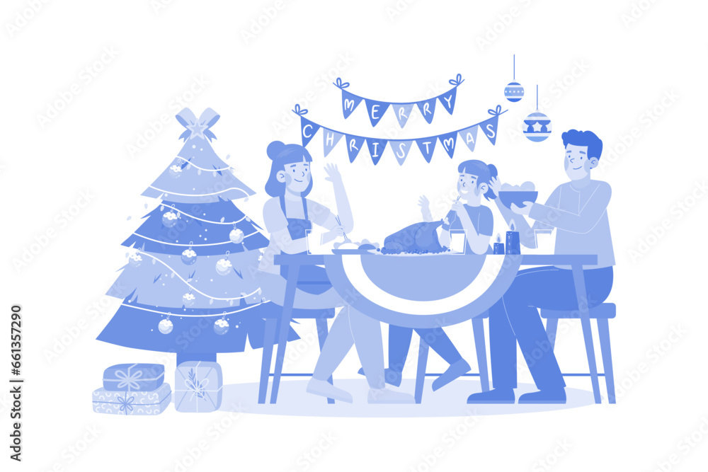 Fototapeta premium Family serving dinner in christmas night