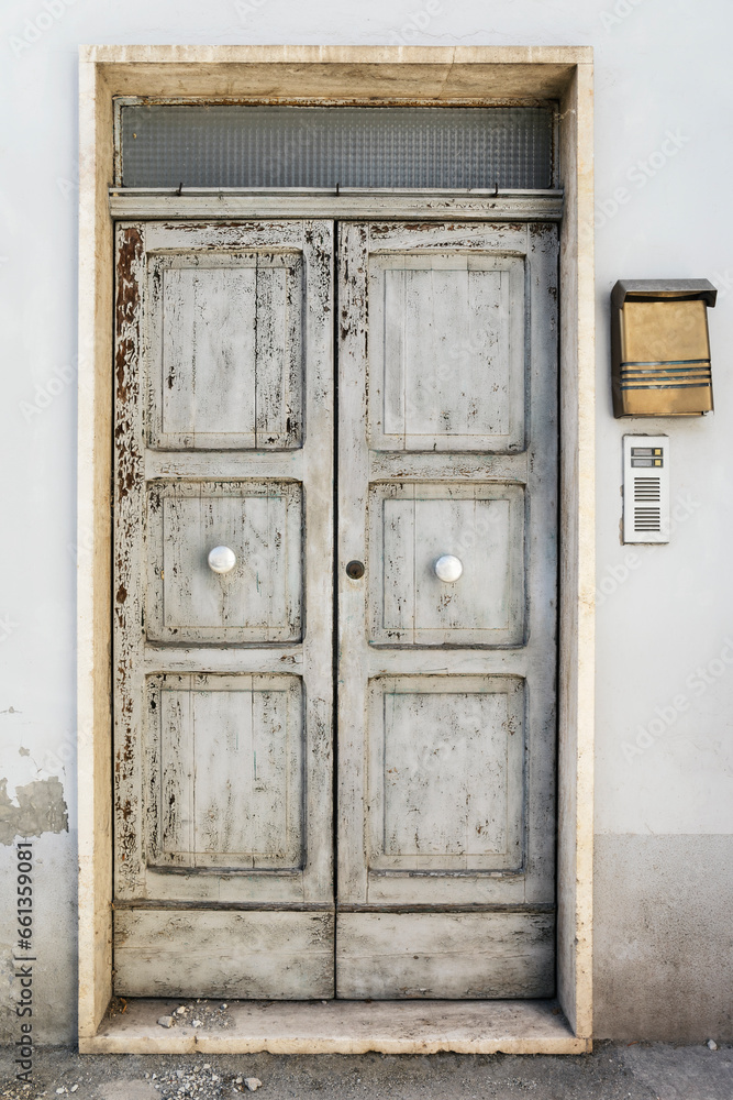 Old doorway of house, front view