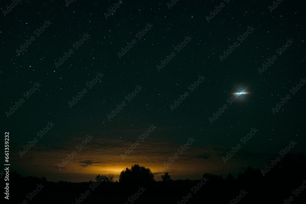 4k Timelapse Amazing Stars In Sky. Real Colorful Night Stars. Misty Sky Movement. Night Sky With Glowing Stars And Meteoric Tracks Trails Above Countryside Rural Landscape. Time Lapse, Time-lapse. 4k Timelapse Amazing Stars In Sky. Real Colorful Night Stars. Misty Sky Movement. Night Sky With Glowing Stars And Meteoric Tracks Trails Above Countryside Rural Landscape. Time Lapse, Time-lapse.