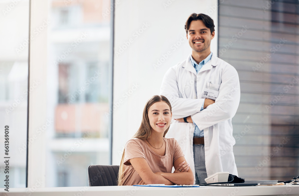 Doctors, man and woman with arms crossed in portrait, smile and hospital office with leadership for medical job. Clinic staff, medic team and happy together for wellness with receptionist at desk Doctors, man and woman with arms crossed in portrait, smile and hospital office with leadership for medical job. Clinic staff, medic team and happy together for wellness with receptionist at desk