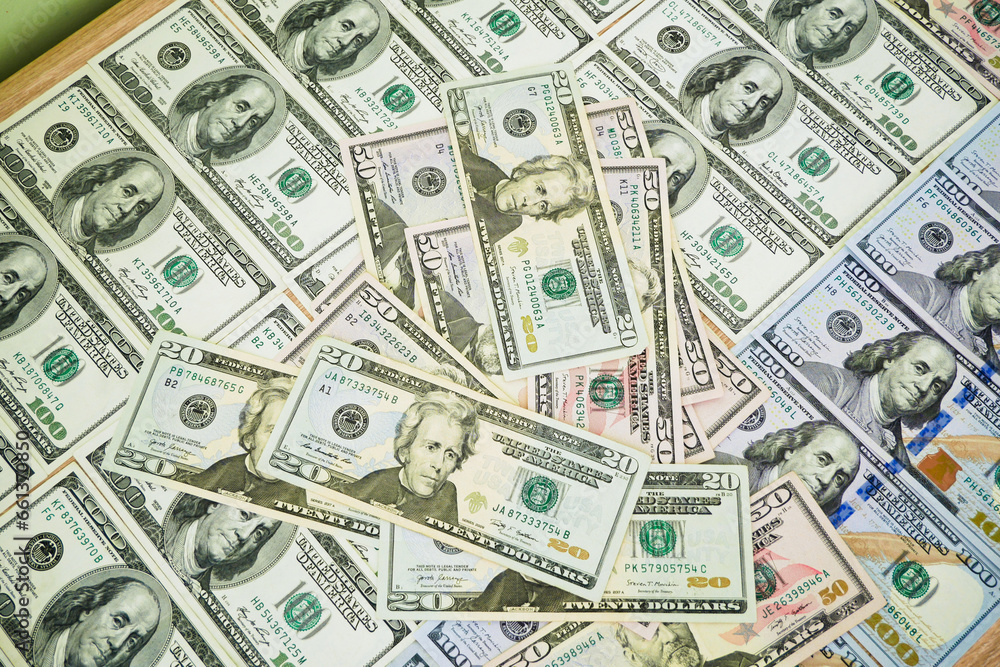 big stack of dollar USA money on wooden background. money cash big stack of dollar USA money on wooden background. money cash