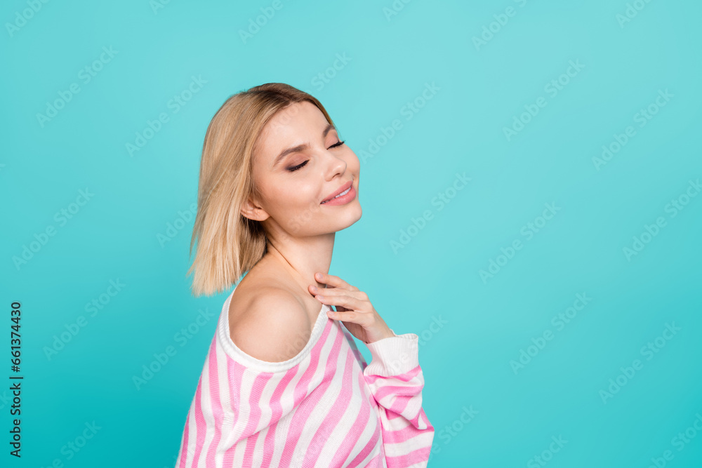 Portrait of young gorgeous lady wearing striped shirt touch her neck feel comfort lightness menstruation isolated on cyan color background Portrait of young gorgeous lady wearing striped shirt touch her neck feel comfort lightness menstruation isolated on cyan color background