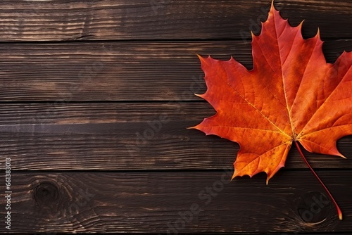 Autumn's Gentle Embrace: A Lone Maple Leaf on Rich Wooden Planks Showcasing Nature's Beauty. Generative AI