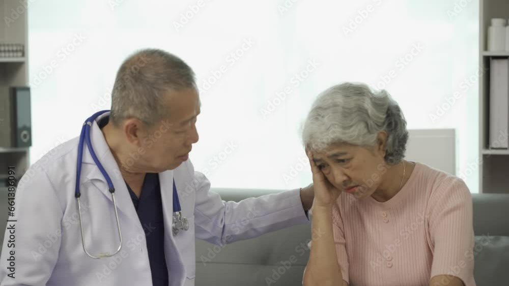 Professional senior male doctor consulting and examining senior female patient at hospital Relaxed atmosphere The concept of health care, mental health, caring for the elderly Professional senior male doctor consulting and examining senior female patient at hospital Relaxed atmosphere The concept of health care, mental health, caring for the elderly