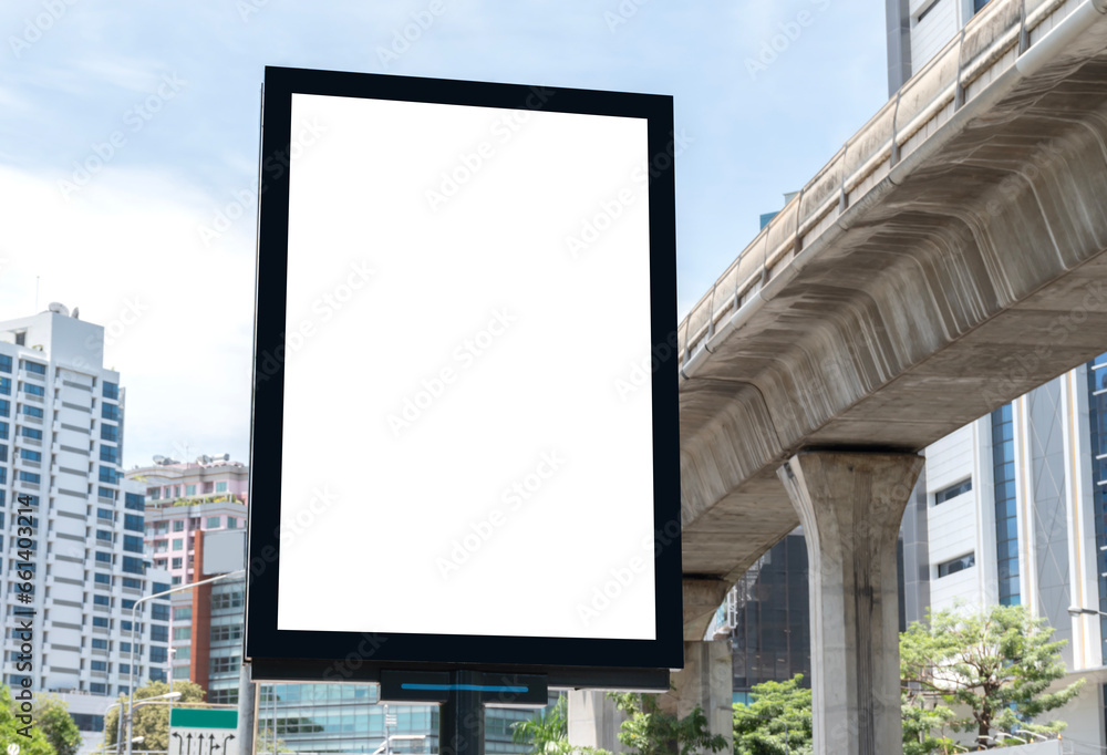 Outdoor pole vertical light box billboard with mock up white screen. Clipping path for mock up Outdoor pole vertical light box billboard with mock up white screen. Clipping path for mock up