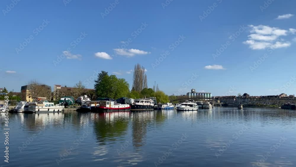 Panoramic video of the city of Auxerre on a bright sunny day with the river and the Saint-Etienne d'Auxerre Cathedral in the background Panoramic video of the city of Auxerre on a bright sunny day with the river and the Saint-Etienne d'Auxerre Cathedral in the background