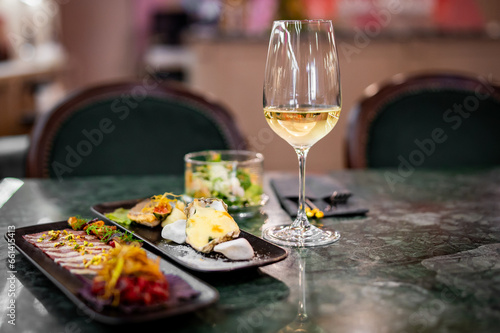 Wallpaper Mural tasting set appetizer food and white wine glass Torontodigital.ca