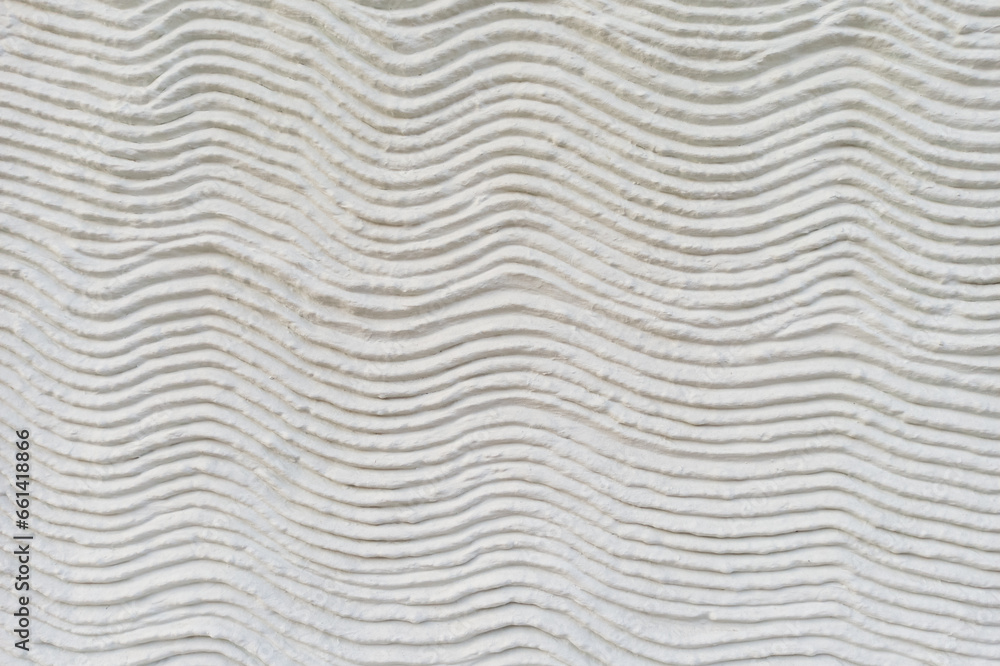 Close-up of horizontal waves in the mortar of a house wall Close-up of horizontal waves in the mortar of a house wall