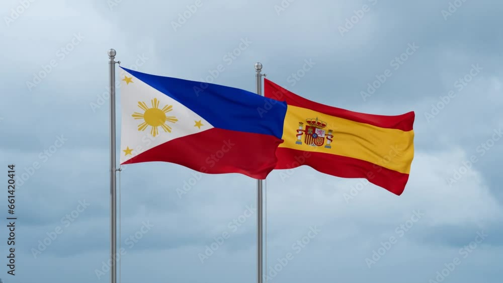 Spain and Philippines flag waving together on cloudy sky, endless seamless loop, two country cooperation concept Spain and Philippines flag waving together on cloudy sky, endless seamless loop, two country cooperation concept
