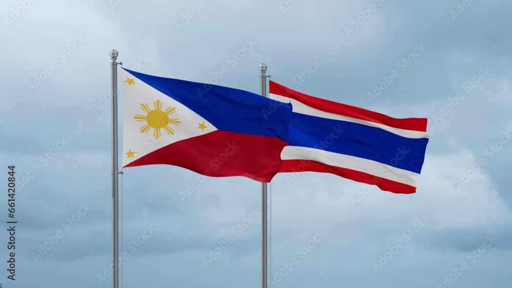 Kingdom of Thailand and Philippines flag waving together on cloudy sky, endless seamless loop, two country cooperation concept Kingdom of Thailand and Philippines flag waving together on cloudy sky, endless seamless loop, two country cooperation concept