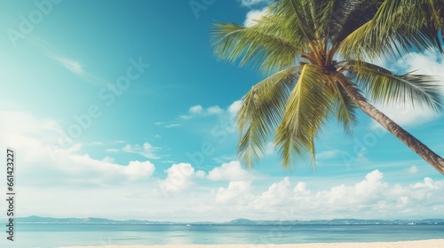 Fototapeta Naklejka Na Ścianę i Meble -  Palm tree on tropical beach with blue sky and white clouds abstract background. Copy space of summer vacation and business travel concept. Vintage tone filter effect color style.