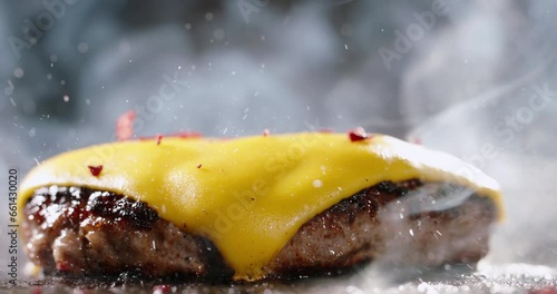 Fried vegetarian cutlets with melted cheese on top. Cinematic advertising plant-based imitation burger cooking. Art of cooking healthy food flavorful vegetable cutlets sizzling in frying pan, low-carb