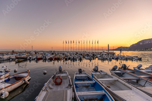 Sunset over a small marina on Lake Garda, Italy