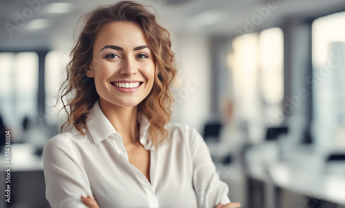 Smiling businesswoman in office © karandaev