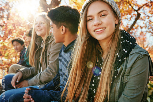 Teenager  group and portrait in park  girl and diversity on holiday  nature and relax by trees. Youth culture  happy friends and gen z school kids in sunshine  woods or garden for vacation in Canada