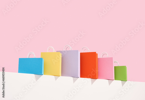 Colorful shopping bags. Shopaholism and waste of money.