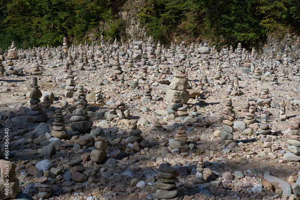 River pebbles stacked in towers