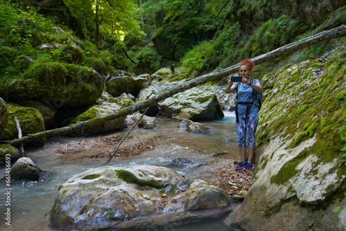 Womah hiker exploring a gorge photo