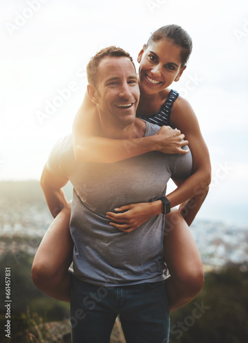 Portrait, piggy back and couple with love, outdoor and lens flare with happiness, freedom and bonding. Face, man carrying woman and adventure with health, journey or outside with wellness or vacation