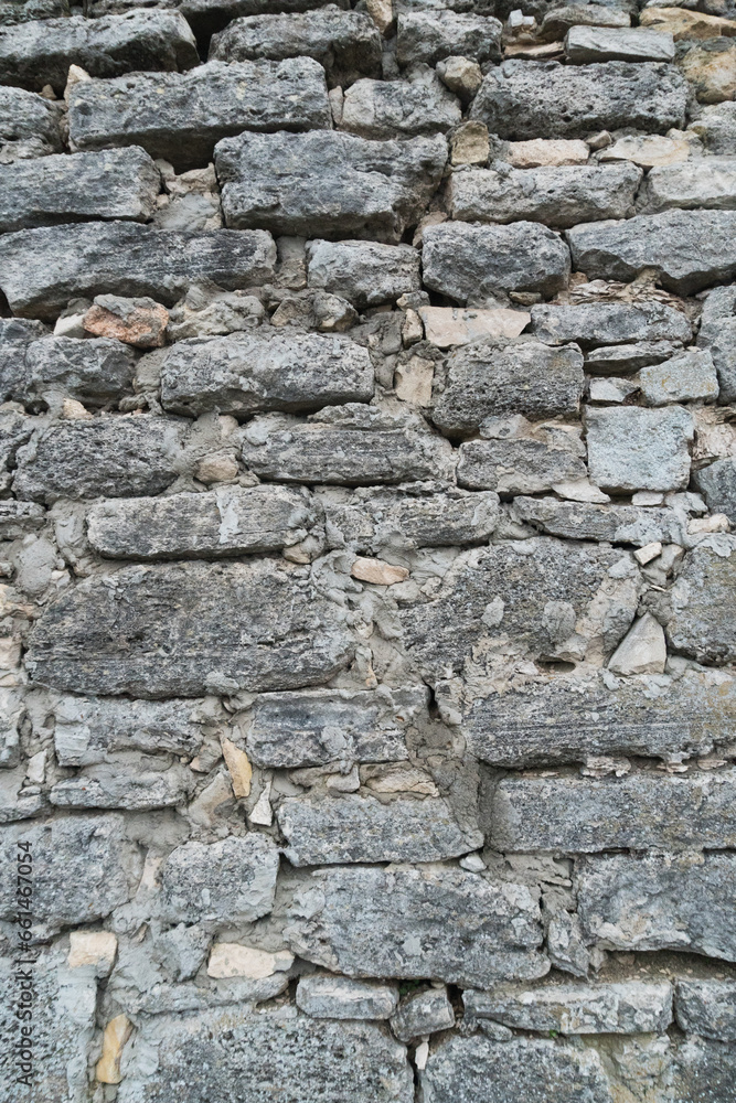 Grey grunge textured old stone wall. Grey grunge textured old stone wall.