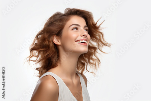 young pretty girl happy over isolated white background