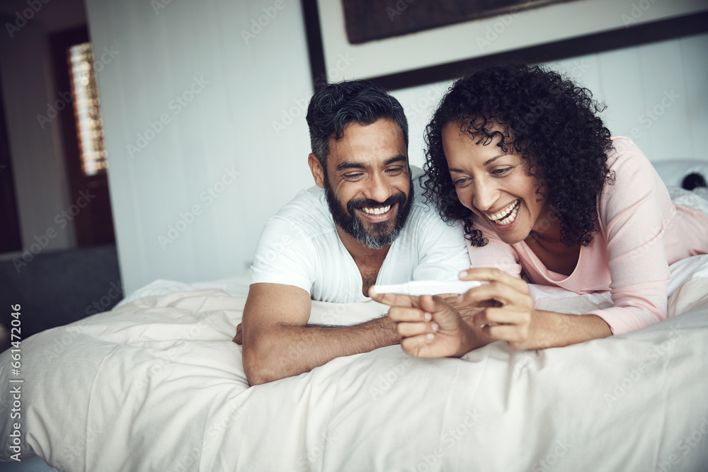 Couple, smiling and bedroom with pregnancy test, positive and bed with happiness, results and excited. Man, woman and baby with stick, love and maternity for future family, surprise and pregnancy Couple, smiling and bedroom with pregnancy test, positive and bed with happiness, results and excited. Man, woman and baby with stick, love and maternity for future family, surprise and pregnancy