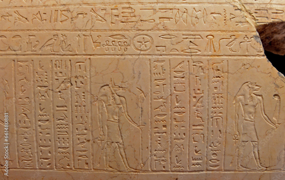 The walls of the room with stone carvings tell the story of the Egyptians in the pyramid The walls of the room with stone carvings tell the story of the Egyptians in the pyramid