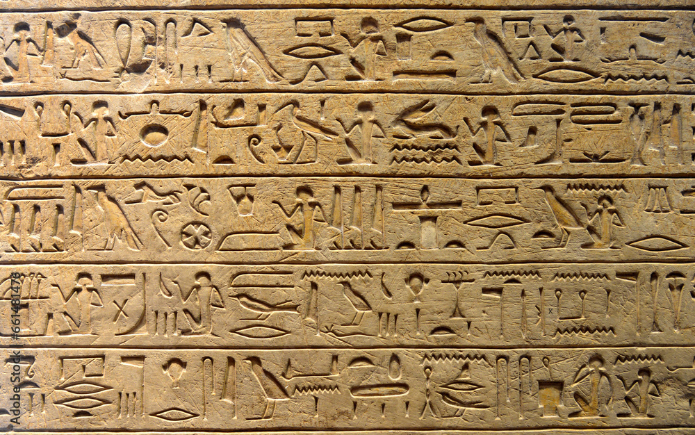 Hieroglyphics on stone slabs in a pyramid