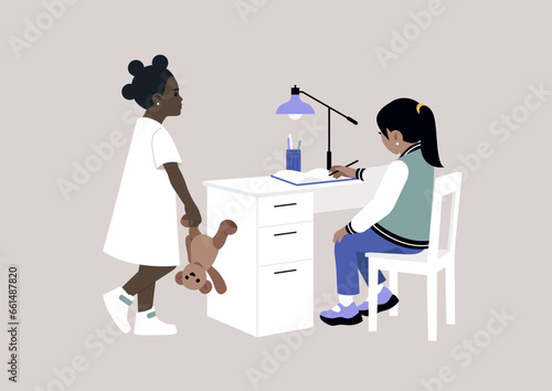 A bored child eager to play with their sibling who is engrossed in completing their preschool homework at the desk