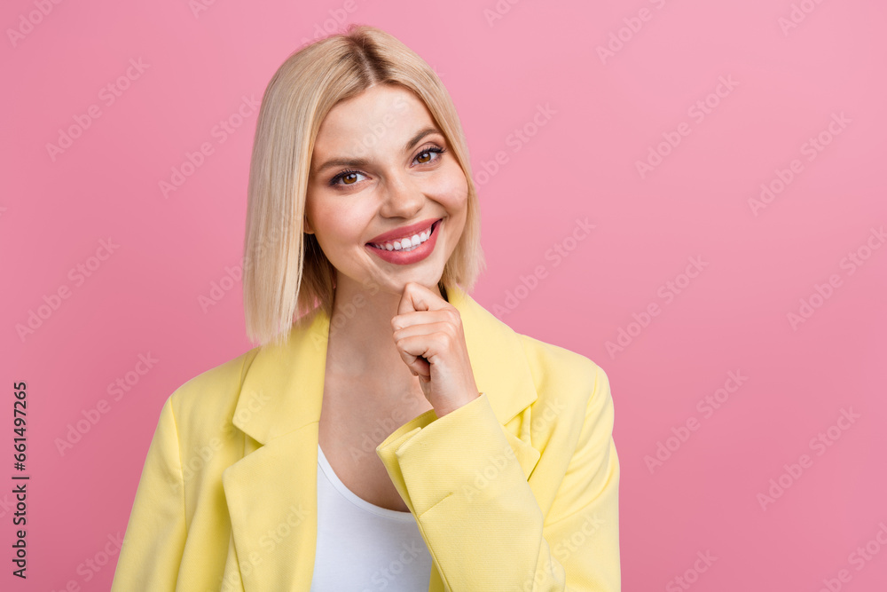 Photo of lovely positive minded person hand touch chin brainstorming empty space isolated on pink color background Photo of lovely positive minded person hand touch chin brainstorming empty space isolated on pink color background