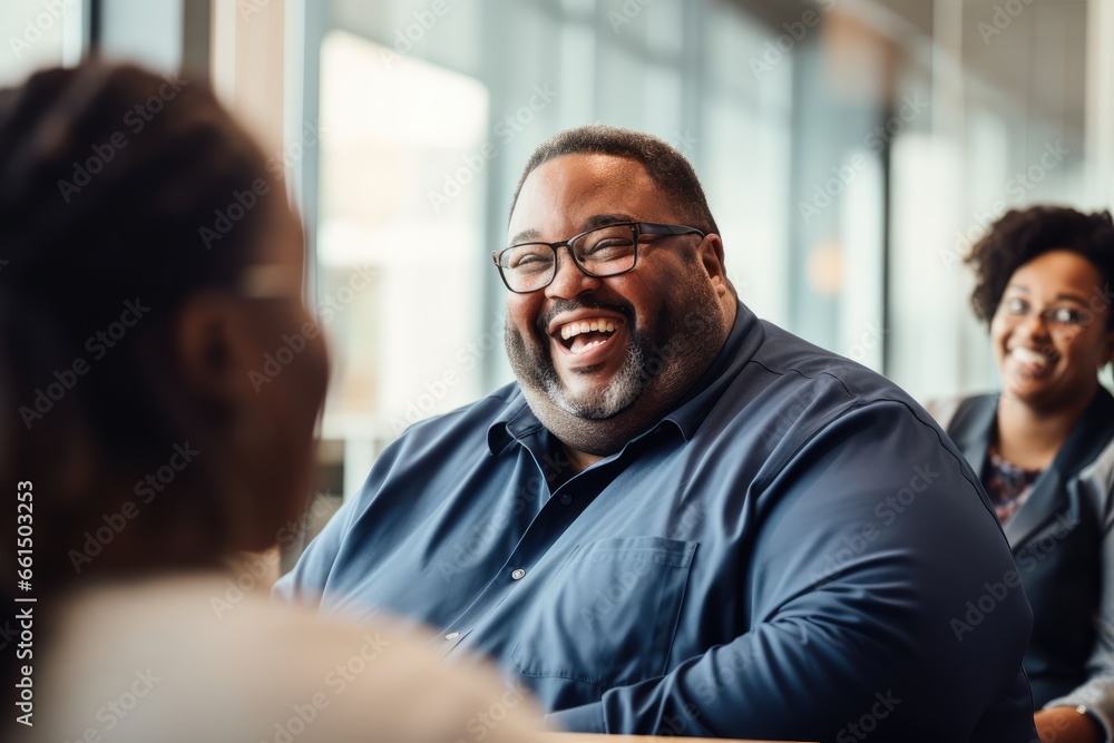 Plus-size manager sharing a light moment with the team during a break - Leadership and Laughter - AI Generated Plus-size manager sharing a light moment with the team during a break - Leadership and Laughter - AI Generated