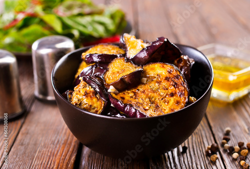 fried egg plant with Chinese chili sauce bowl