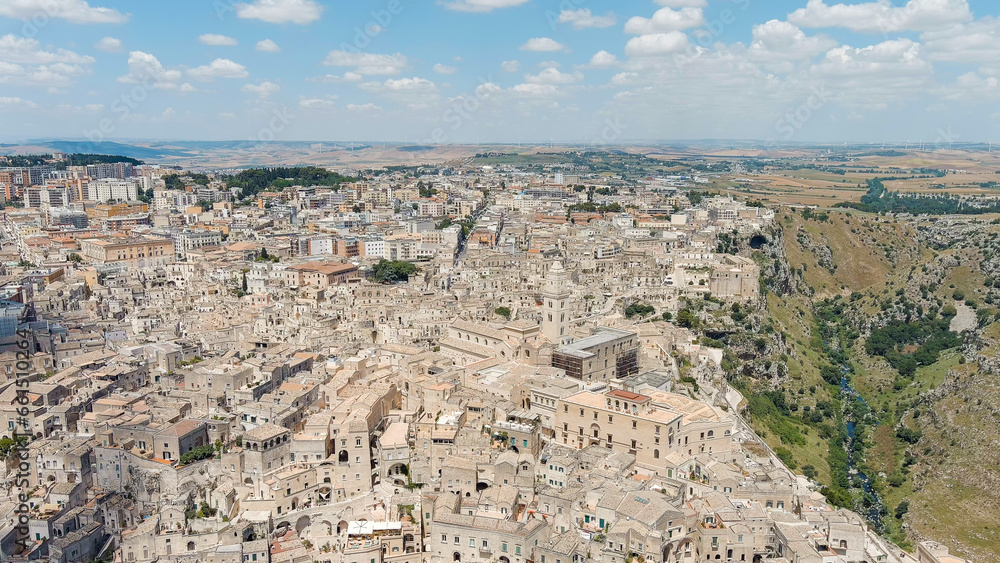 Matera, Italy. The old part of the city is carved into the rock and is a UNESCO World Heritage Site. Summer day, Aerial View