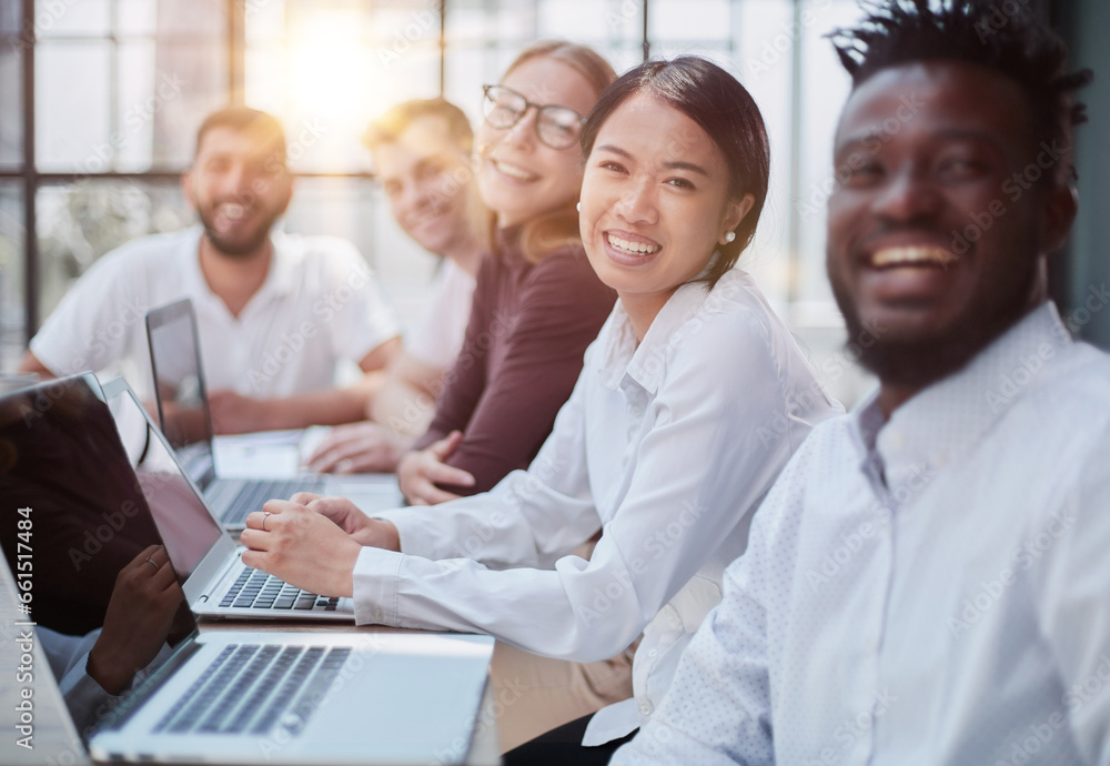 Multiethnic business people working together in the office Multiethnic business people working together in the office