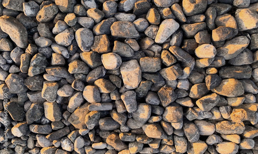 Stone background, small pebbles, large pebbles, colorful rocks or garden rocks. Background of simple sea rocks, abstract shapes created from nature. Stone background, small pebbles, large pebbles, colorful rocks or garden rocks. Background of simple sea rocks, abstract shapes created from nature.