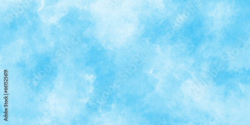 Sky clouds with brush painted blue watercolor texture, small and large clouds alternating and moving slowly on cloudy winter morning blue sky, white cloud and clear blue Abstract sky in sunny day.