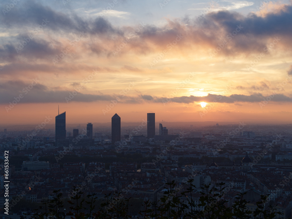 Cloudy and foggy sunrise over Lyon skyline, view from Fourviere hill, Lyon, France
