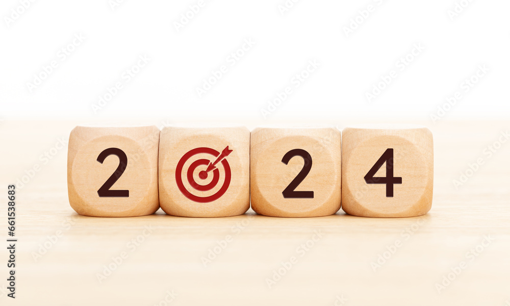 2024 business goals concept. Wooden blocks with 2024 number and goal target icon. Copy space 2024 business goals concept. Wooden blocks with 2024 number and goal target icon. Copy space