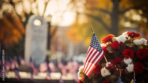 A solemn gathering at the local veterans memorial, with American flags and wreaths, with copy space, blurred background