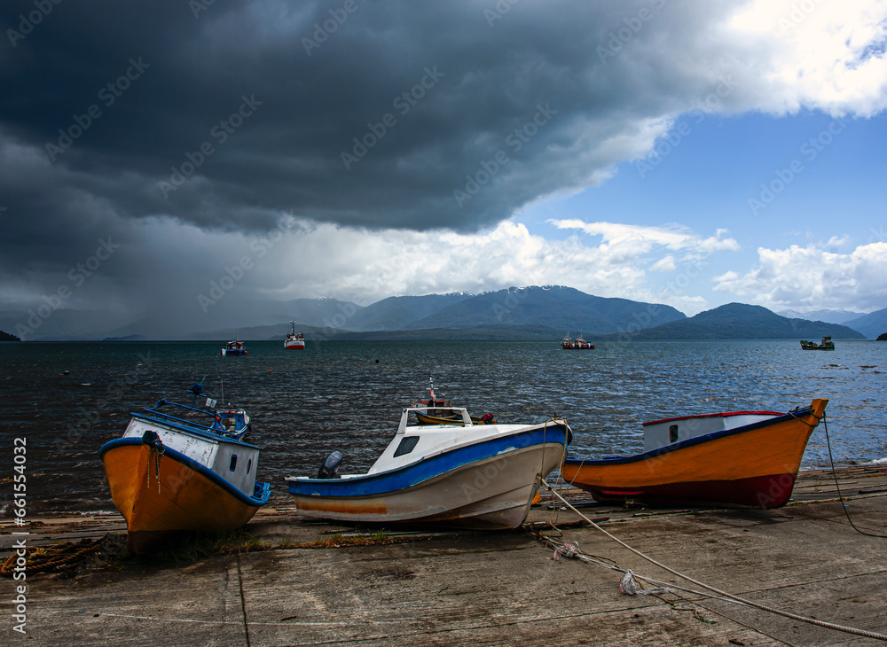 Fototapeta premium Fishing boats on the beach of Puerto Cisnes, Aysén, Chilean Patagonia