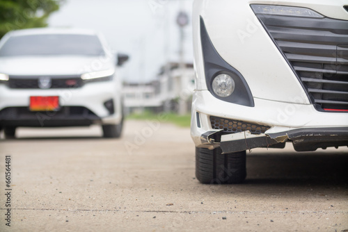 sedan had an accident and damaged front bumper and  owner of car had purchased car accident insurance and  car was still under insurance period. Concept of buying car accident insurance © thatinchan
