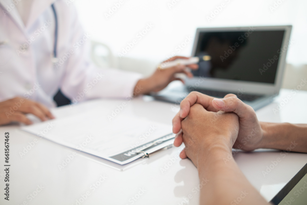 A heart patient visits a doctor for advice on health care and medication to treat heart disease symptoms after the medical team has diagnosed and examined the patient for heart abnormalities. A heart patient visits a doctor for advice on health care and medication to treat heart disease symptoms after the medical team has diagnosed and examined the patient for heart abnormalities.