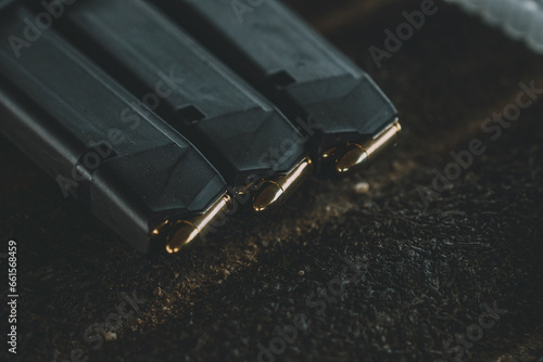 Close up of a row of 9mm pistol magazines.