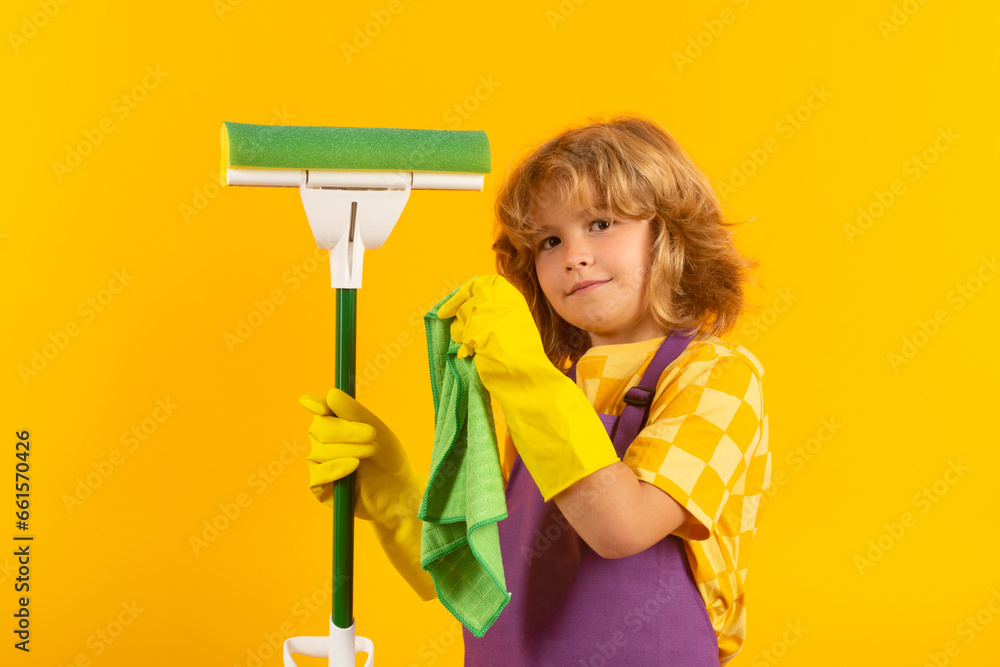 Child doing housework. Studio portrait of child helping with housework, cleaning the house. Housekeeping, home chores. Child doing housework. Studio portrait of child helping with housework, cleaning the house. Housekeeping, home chores.
