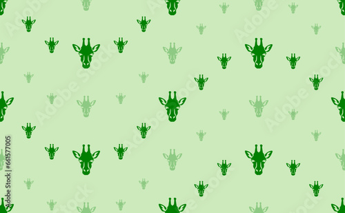 Seamless pattern of large and small green giraffe head symbols. The elements are arranged in a wavy. Vector illustration on light green background © Alexey
