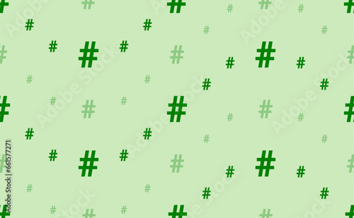 Seamless pattern of large and small green hash symbols. The elements are arranged in a wavy. Vector illustration on light green background