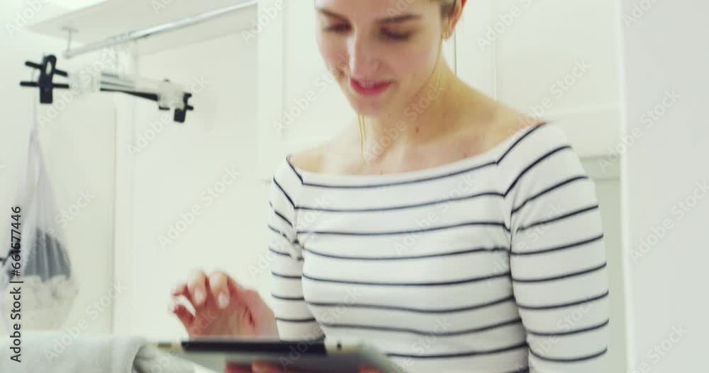 Woman, tablet and sitting on laundry machine for break or relax on social media or internet scroll at home. Person, washing or touchscreen for technology, peace and happiness with housekeeping on web Woman, tablet and sitting on laundry machine for break or relax on social media or internet scroll at home. Person, washing or touchscreen for technology, peace and happiness with housekeeping on web