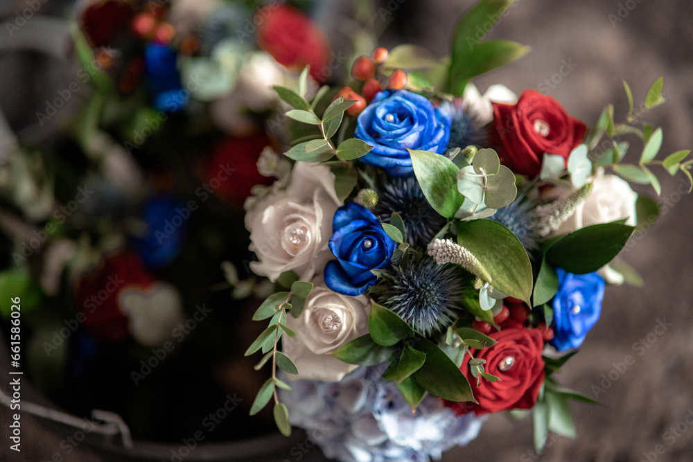 Fresh bunch of red, blue and white roses with copy space
